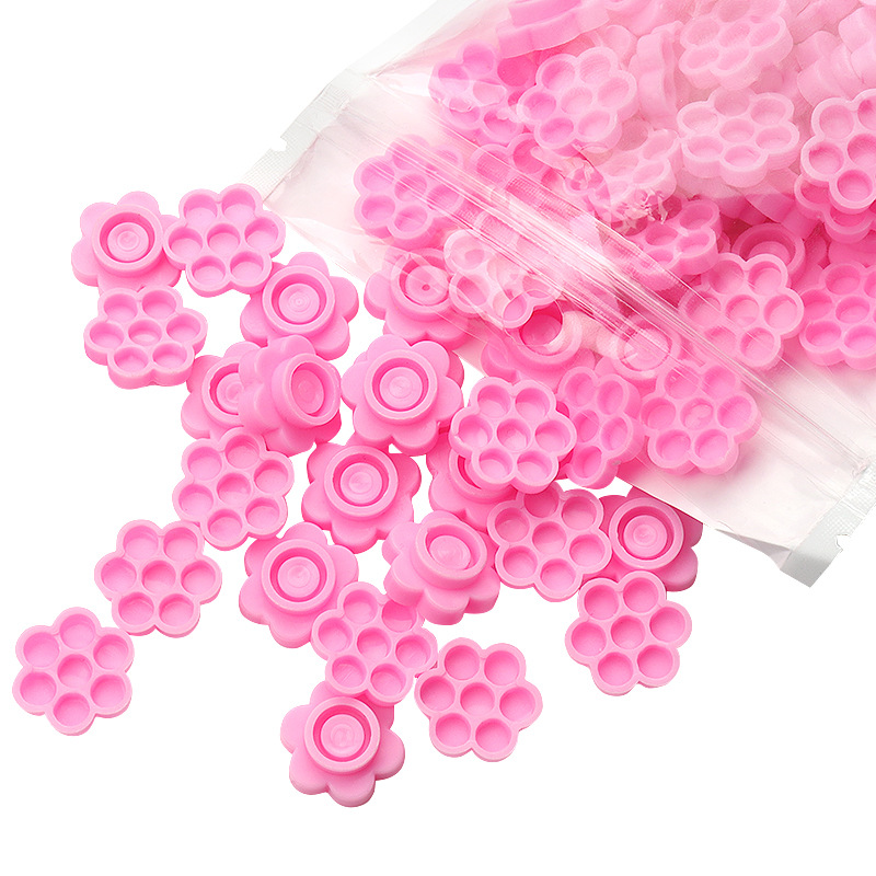 100 Pcs Pink Flower Glue Delay - Eyelash Extension Maps recension och pris
