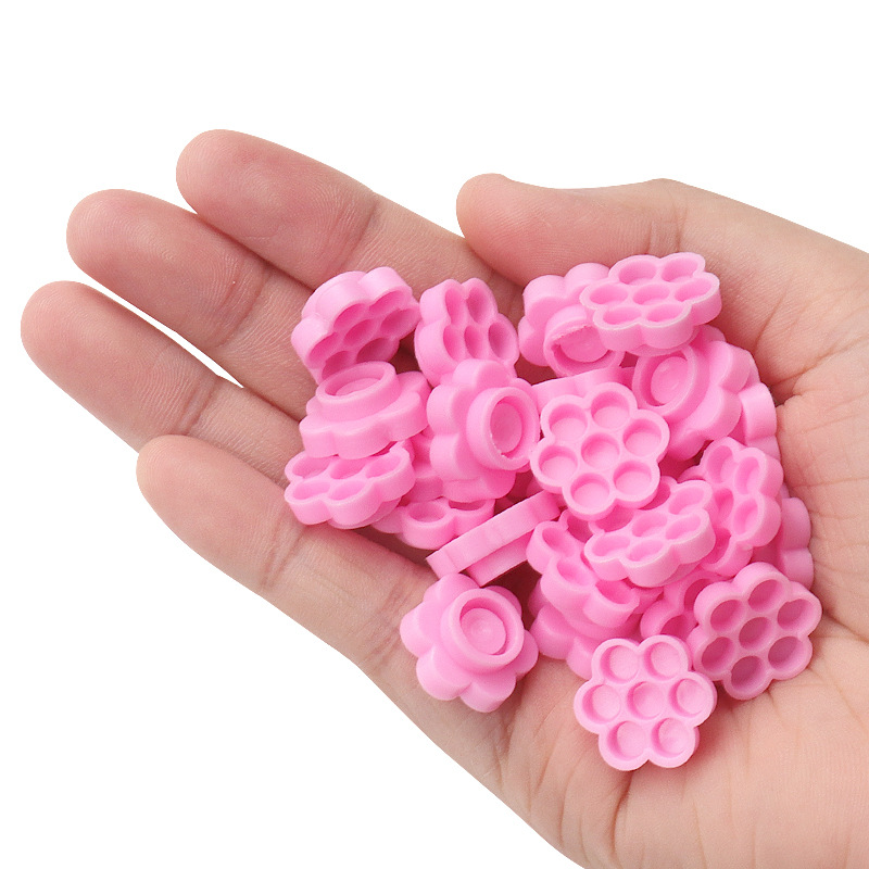 100 Pcs Pink Flower Glue Delay - Eyelash Extension Maps recension och pris