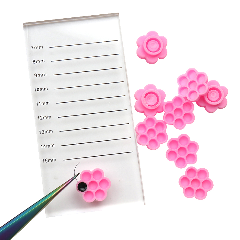 100 Pcs Pink Flower Glue Delay - Eyelash Extension Maps recension och pris